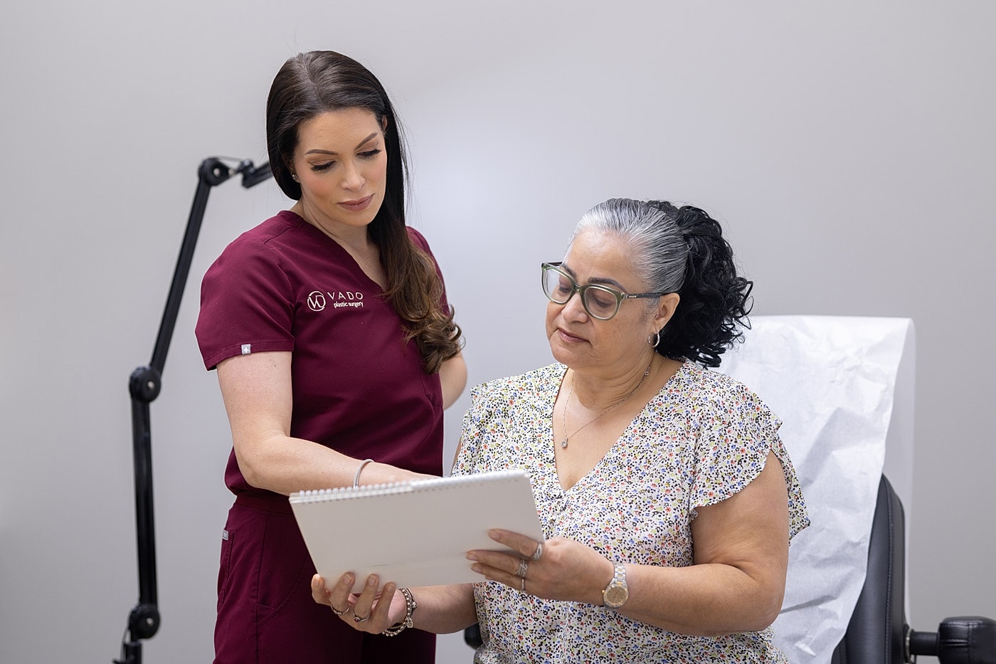 Medical consultation between practitioner and patient.