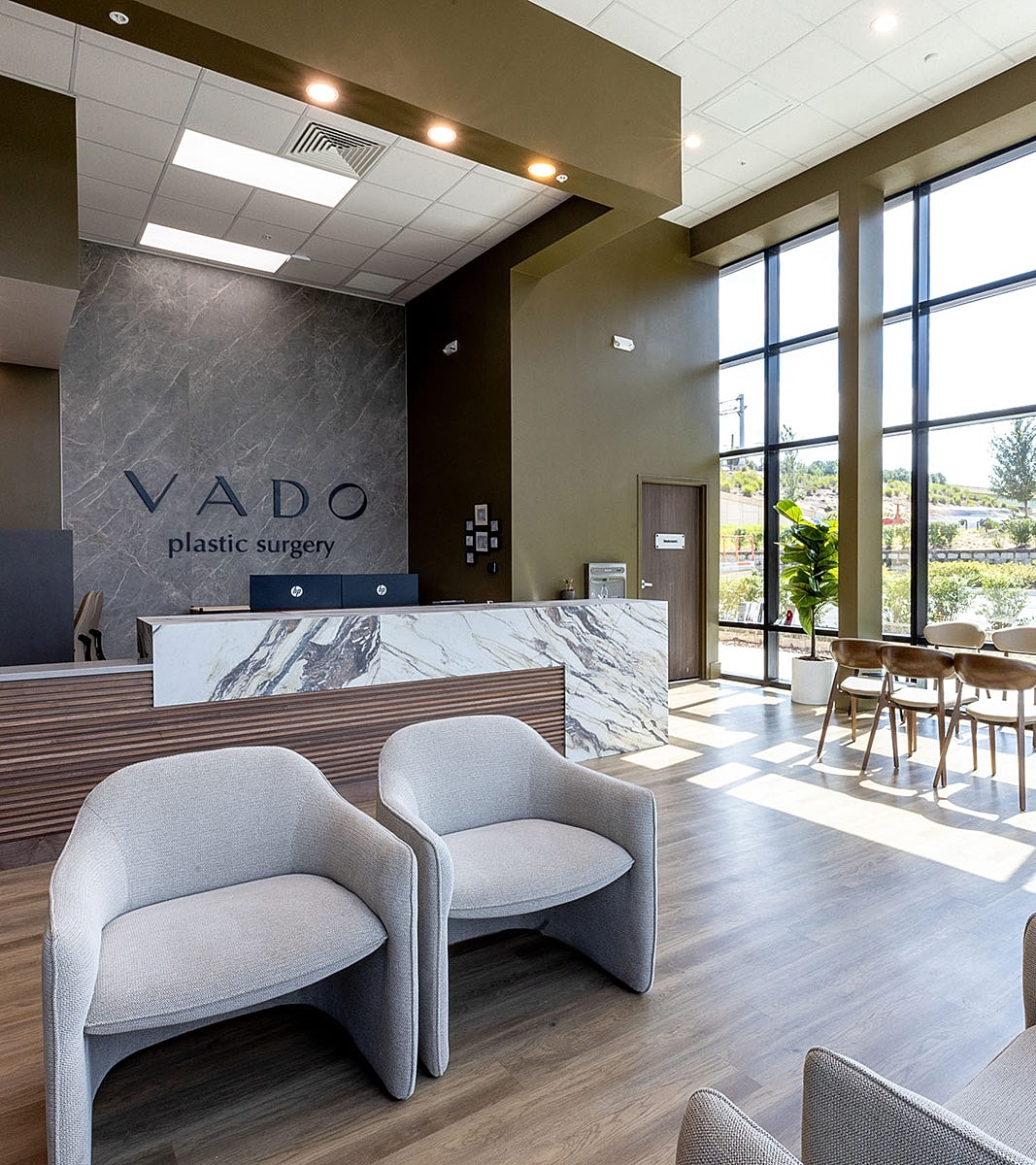 Modern plastic surgery office reception area.