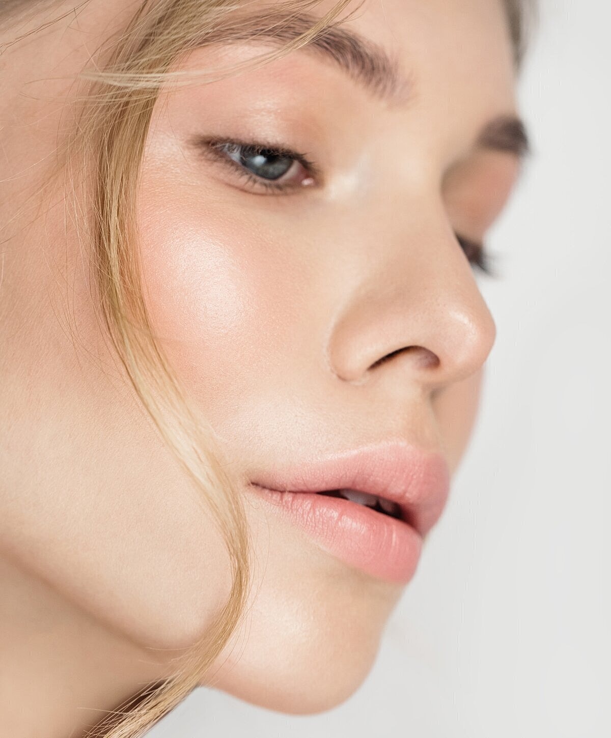 Close-up of a woman's face with soft features.
