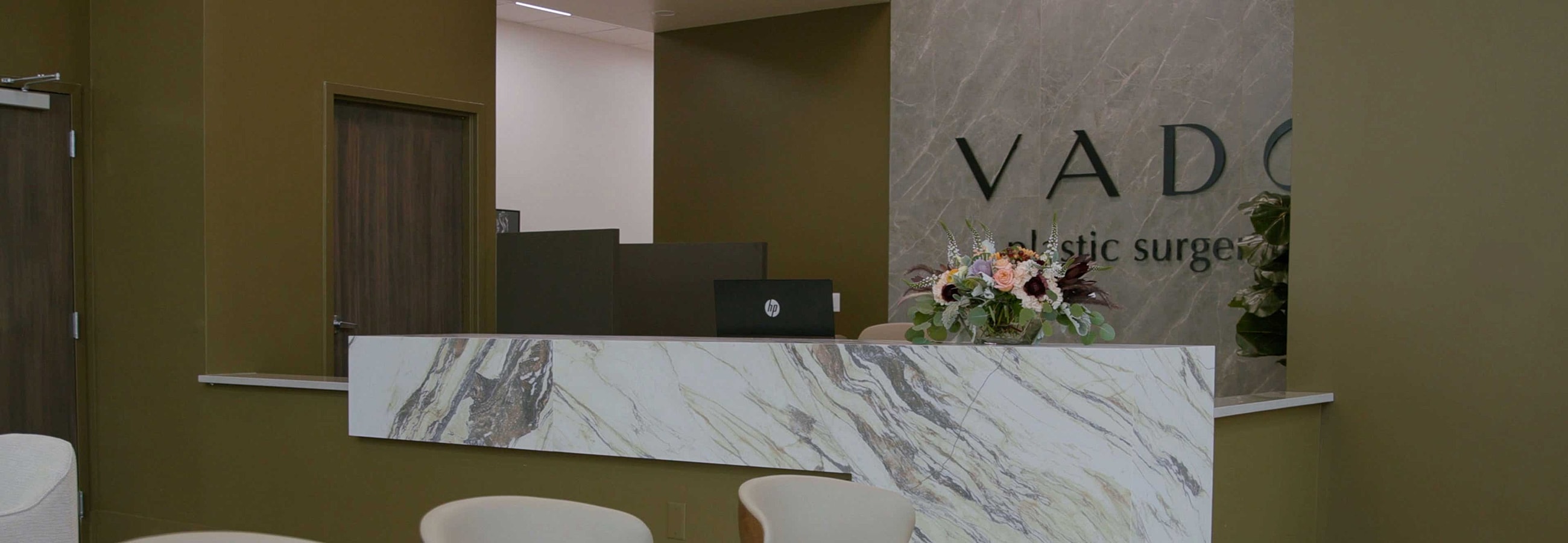 Modern plastic surgery clinic reception area.